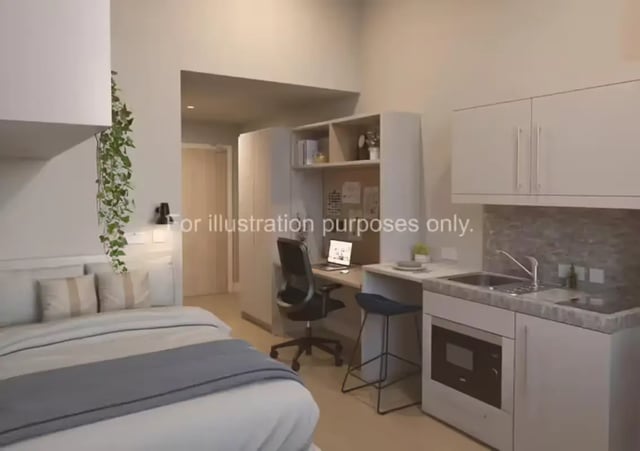 Bed desk kitchen area studio apartment at Glasgow Citi View in Glasgow Student Accommodation