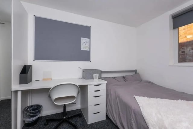 Desk chair bed and bulletin board bedroom at Bertrand Russell House in Nottingham Student Accommodation