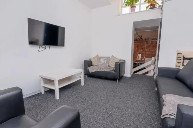 Sofa television white table living room at Bertrand Russell House in Nottingham Student Accommodation