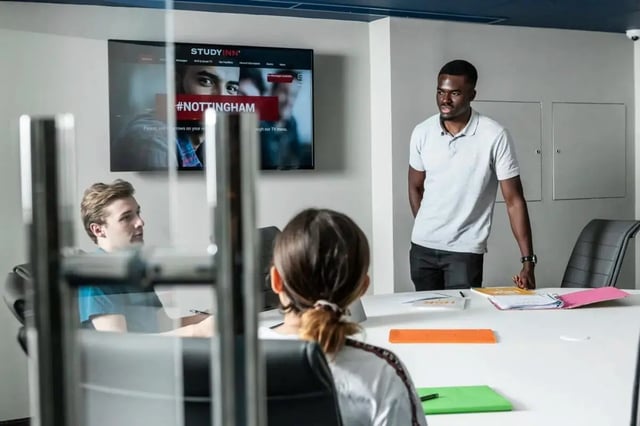 Students in meeting room with presentation screen at Study Inn Talbot Street Nottingham in Nottingham Student Accommodation