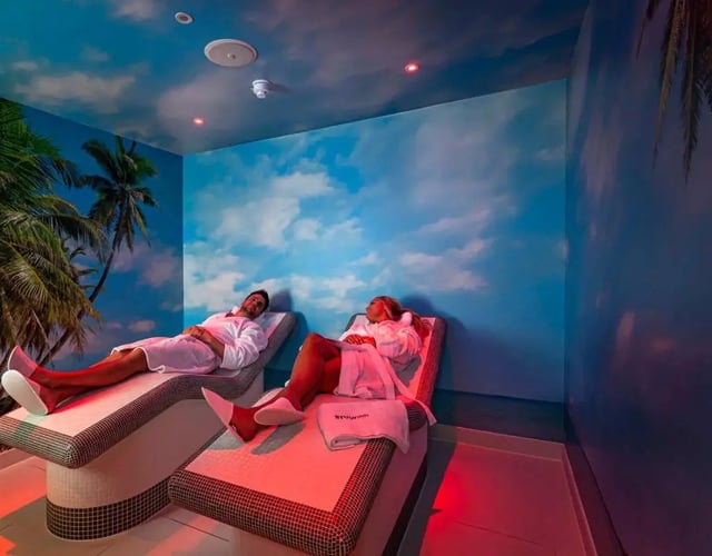 Two people relax on lounge chairs spa area at Study Inn Talbot Street Nottingham in Nottingham Student Accommodation