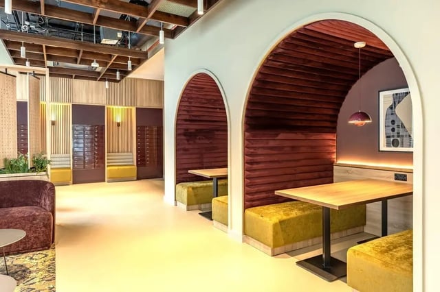 Booth seating with tables and mailboxes communal area at The Place in Nottingham Student Accommodation