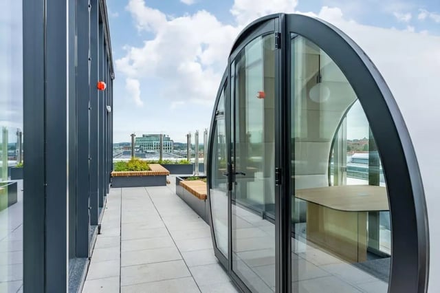 Glass pod with desk on rooftop balcony exterior at The Place in Nottingham Student Accommodation
