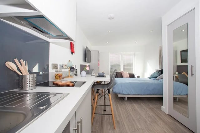Modern studio kitchen with bed and sofa living room at The Laceworks Nottingham in Nottingham Student Accommodation