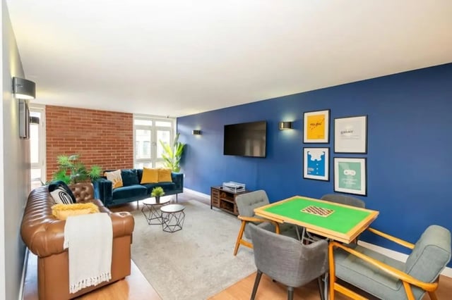 Sofas tables game and pictures living room at Cornerhouse in Sheffield Student Accommodation