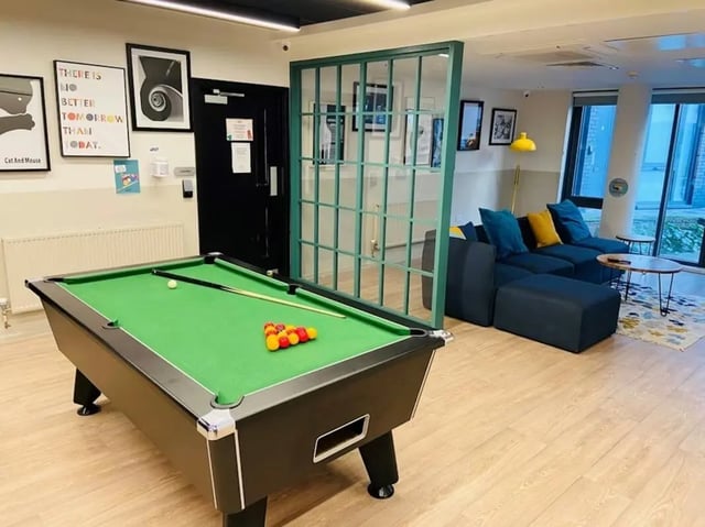 Pool table sofas and coffee table common area at Laycock Studios in Sheffield Student Accommodation