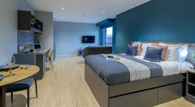 Bed desk table and chair studio apartment at Crown House in Sheffield Student Accommodation