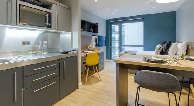 Kitchen desk bed and table studio apartment at Crown House in Sheffield Student Accommodation