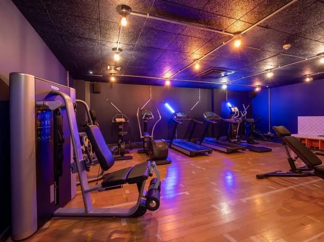 Gym equipment including treadmills and weight machines gym area at Crown House in Sheffield Student Accommodation