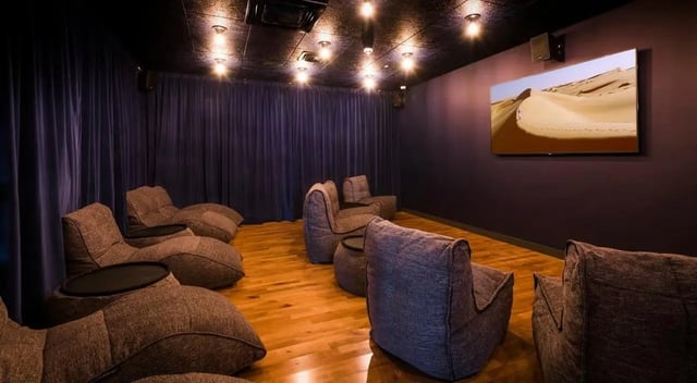 Beanbag chairs with screens in a viewing room at Crown House in Sheffield Student Accommodation