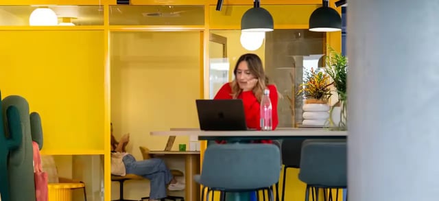 Yellow study pods with people working study area at Scape Lachlan in Sydney Student Accommodation