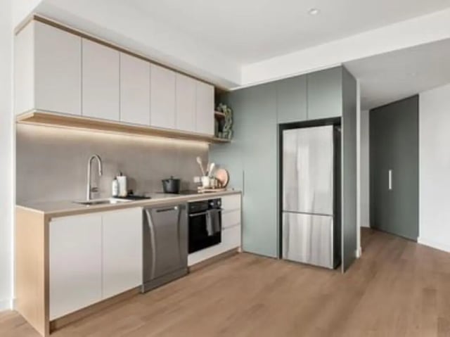 Modern kitchen with stainless steel appliances kitchen at Caulfield Place in Melbourne Student Accommodation