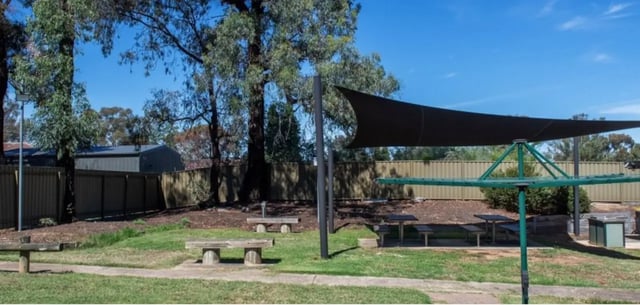 Picnic tables benches clothesline shade cloth exterior at La Trobe University - Orde House in Melbourne Student Accommodation