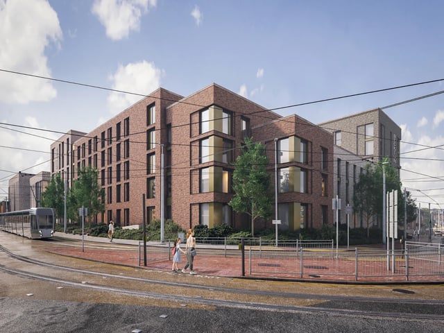 Brick apartment building tram tracks street exterior at Beckton House in Nottingham Student Accommodation