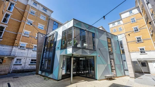 Modern student accommodation entrance with geometric exterior design Exterior at Emily Davies in Southampton Student Accommodation