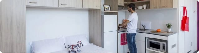 Bed fridge microwave kitchen student accommodation interior at La Trobe University - Orde House in Melbourne Student Accommodation