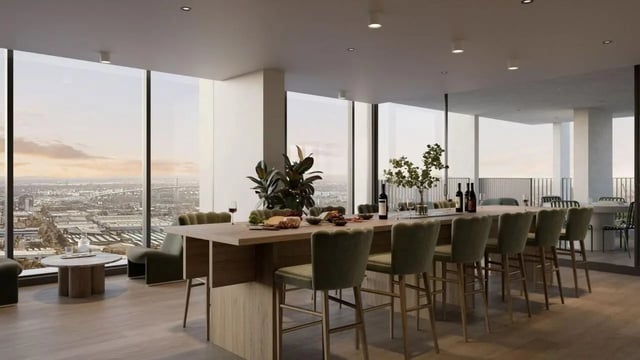 Communal dining table with bar stools and food communal area dining room at The Archive - Residential Living in Melbourne Student Accommodation