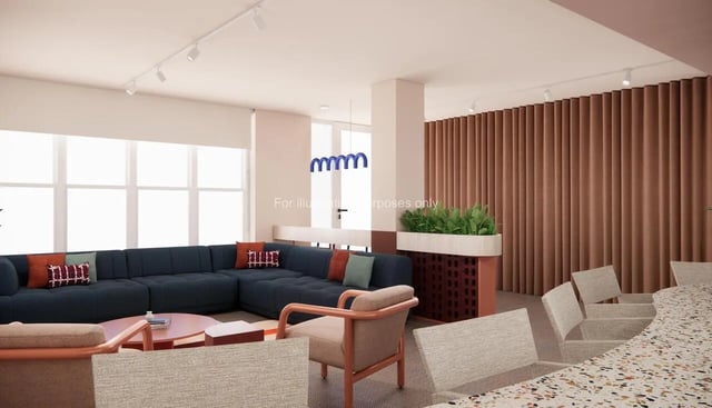 Large sectional sofa lounge chairs and bar seating living room at Selly Oak Court in Birmingham Student Accommodation