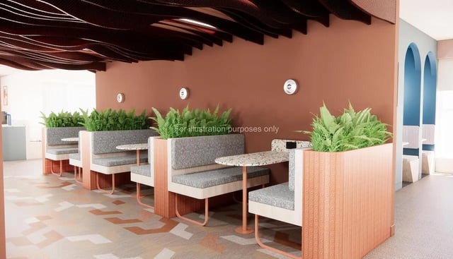 Booth seating with plants and tables communal area at Selly Oak Court in Birmingham Student Accommodation