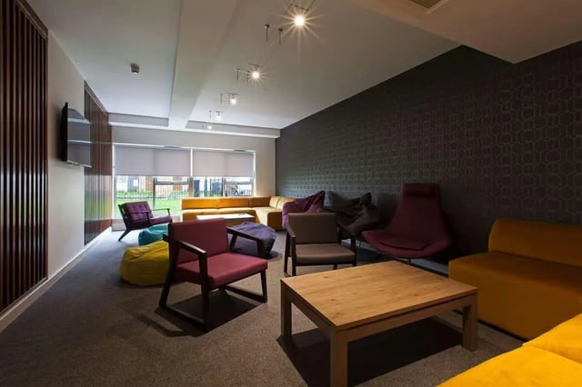 Modern living area with sofas chairs beanbags living room at Selly Oak Court in Birmingham Student Accommodation