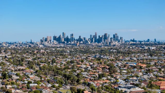 Suburban homes with distant city skyline exterior at WeAreLiving Preston in Melbourne Student Accommodation