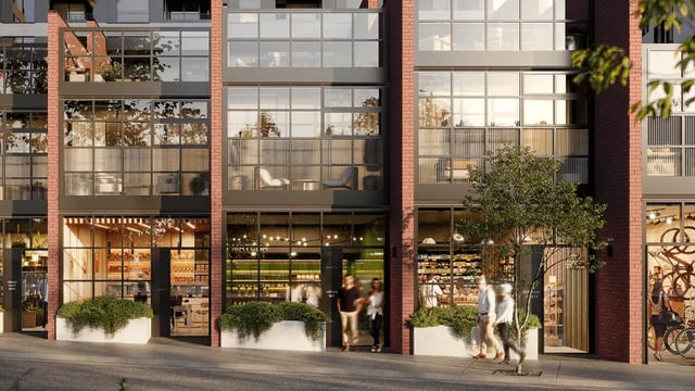 Shops with people and plants exterior at WeAreLiving Preston in Melbourne Student Accommodation
