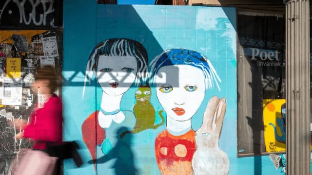 Mural of two girls cat and rabbit exterior at WeAreLiving Preston in Melbourne Student Accommodation