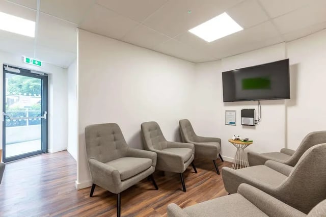 Chairs and TV in a common room at Hollingbury House in Brighton Student Accommodation