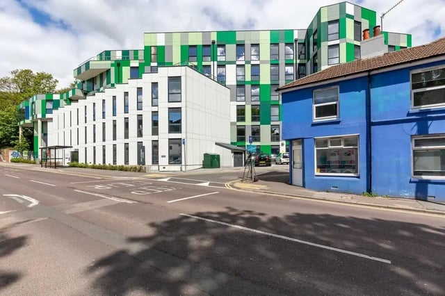 Modern green and white building facade exterior at Hollingbury House in Brighton Student Accommodation
