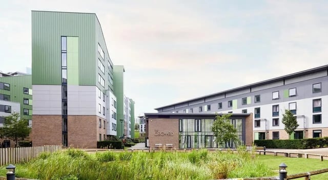 Modern student accommodation buildings with grass exterior at The Green in Bradford Student Accommodation