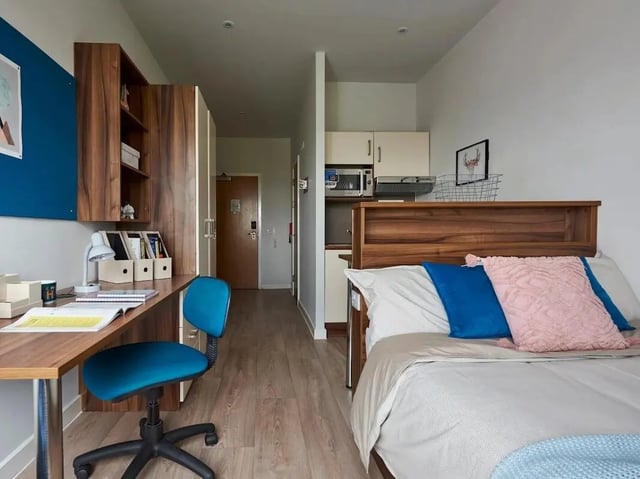 Desk chair bed kitchen microwave studio room at Central Studios Reading in Reading Student Accommodation
