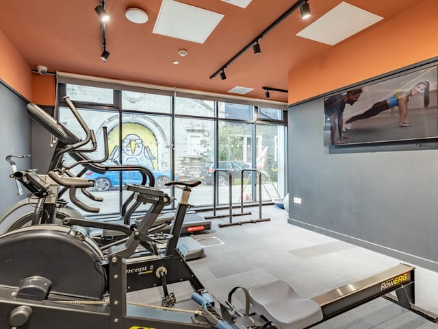 Gym equipment elliptical rower exercise bike fitness room at Stanley Studios - Dundee in Dundee Student Accommodation
