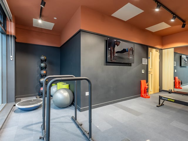 Gym equipment with balls and a rowing machine gym area at Stanley Studios - Dundee in Dundee Student Accommodation