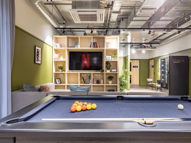 Pool table Netflix screen sofa and vending machine common area at Stanley Studios - Dundee in Dundee Student Accommodation