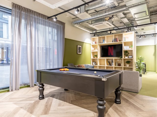 Pool table and bookshelf with TV playing area at Stanley Studios - Dundee in Dundee Student Accommodation