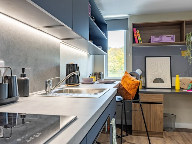 Modern student kitchen with sink kettle and desk area kitchen at Stanley Studios - Dundee in Dundee Student Accommodation