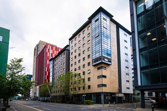 Tall modern buildings with windows and street exterior at Purbeck House in Bournemouth Student Accommodation