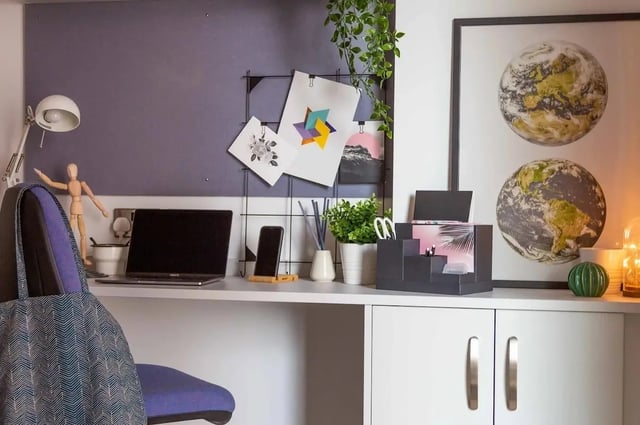 Desk with laptop and decor study area at 123 York Street in Belfast Student Accommodation