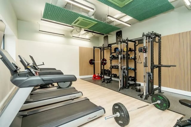 Treadmills weight racks barbells gym equipment fitness area at Sheffield 3 in Sheffield Student Accommodation