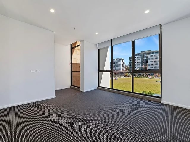 Large window view living room apartment living room at Belong Waterloo in Sydney Student Accommodation