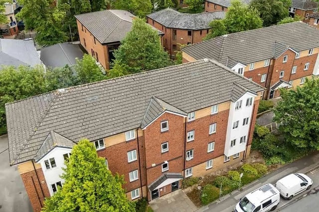Brick apartment buildings with white windows exterior at Woodhouse Flats in Leeds Student Accommodation