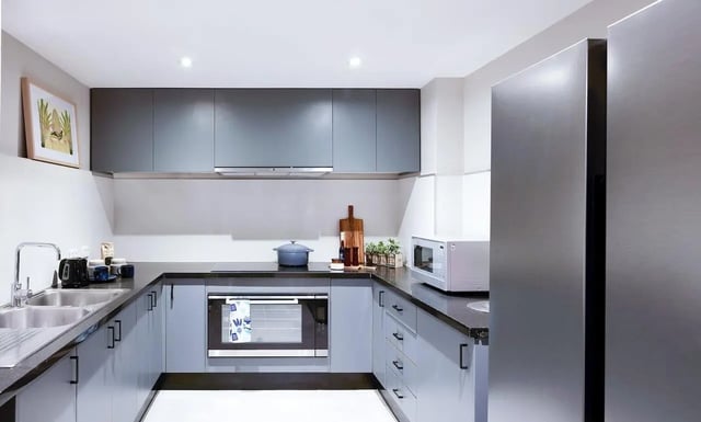 Modern student kitchen with appliances and cabinets kitchen at Campus Melbourne in Melbourne Student Accommodation