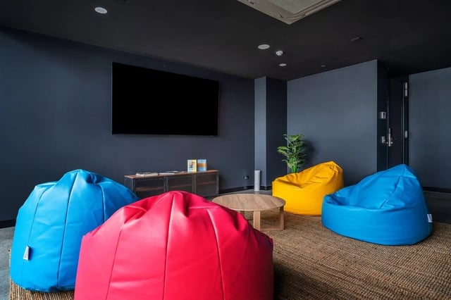 Beanbag chairs television and coffee table common area at Campus Melbourne in Melbourne Student Accommodation