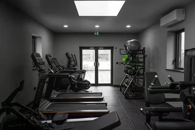 Treadmills weight rack and exercise equipment Gym at The Port On The Square in Bristol Student Accommodation