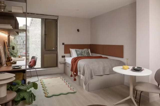 Bed desk chair and round table bedroom at The Pepper Mill in Edinburgh Student Accommodation