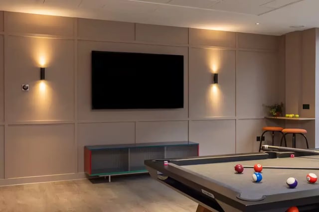 Pool table with balls wall mounted TV living room at The Pepper Mill in Edinburgh Student Accommodation