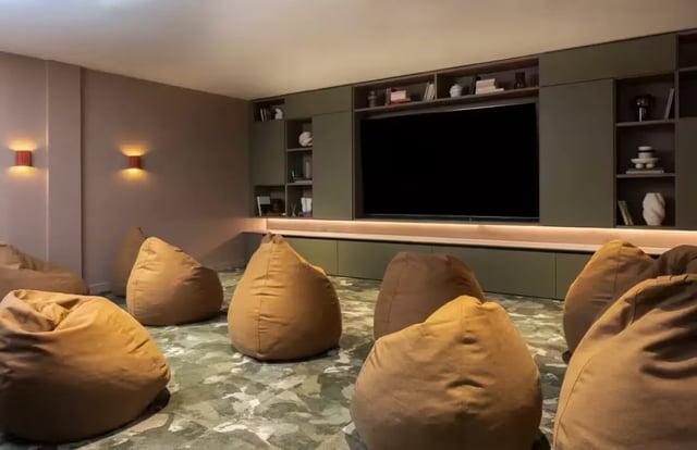 Beanbags and large screen in a lounge area at The Pepper Mill in Edinburgh Student Accommodation