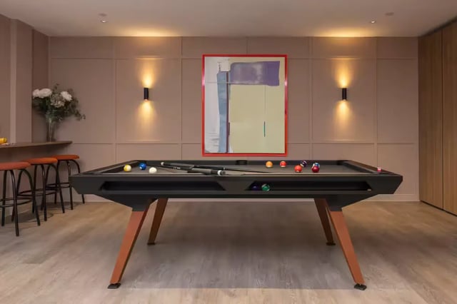 Pool table with balls and cues game room at The Pepper Mill in Edinburgh Student Accommodation