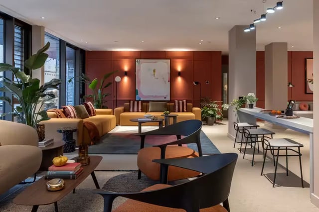 Modern living room with couches and bar seating Living room at The Pepper Mill in Edinburgh Student Accommodation