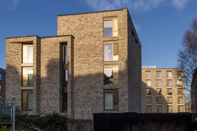 Modern brick building with many windows exterior at The Pepper Mill in Edinburgh Student Accommodation